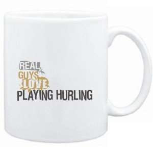   Mug White  Real guys love playing Hurling  Sports: Sports & Outdoors
