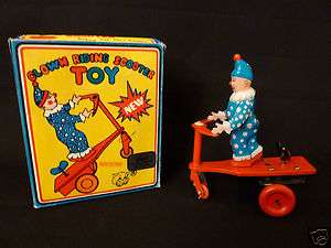 Clown Riding Scooter Wind Up Tin Toy! New in Box!  