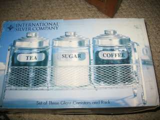 THE INTERNATIONAL SILVER COMPANY SET OF 3 GLASS CANISTERS AND RACK 