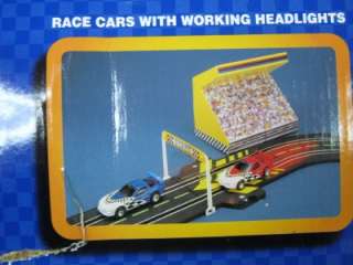 ROAD & TRACK BATTERY OPERATED RACING SET  