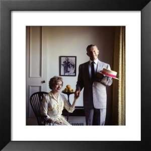 Married Comedy Duo Gracie Allen and George Burns in Front of Photo of 