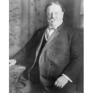 1910 photo William Howard Taft, three quarter length portrait, seated,