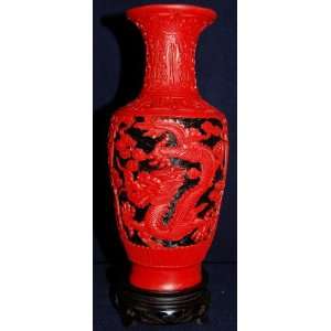    Exquisite Red and Black Cinnabar Dragon Vase. 